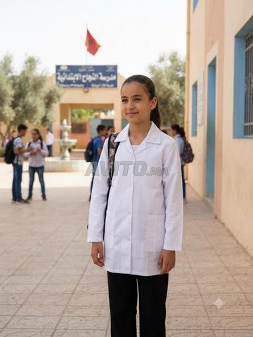 بيع بالجملة طابلية بيضاء بنات توب سيرج