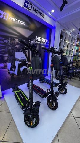 سكوتر كهربائي MAXEWHEEL T4 - 2