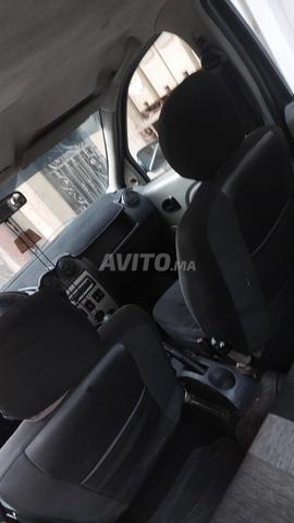 Dacia Logan 2008 noire, en excellent état. - 2
