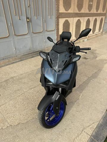 xmax125 douane 2026 première main 14000km