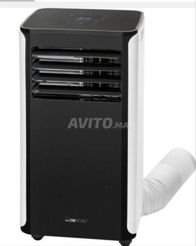 Climatiseur mobile 9000 Btu presque neuf..