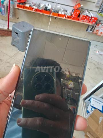 Téléphone propre, juste quelques petites rayures... - 2