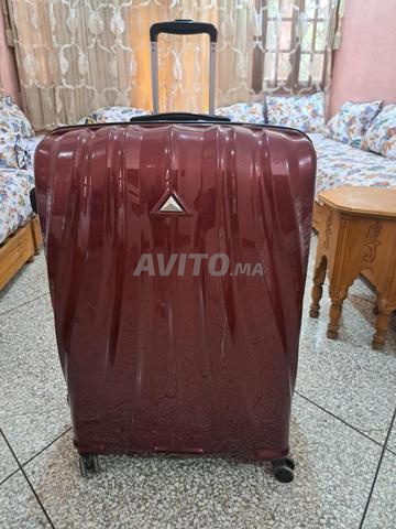 Grande valise pesant 33 kg
