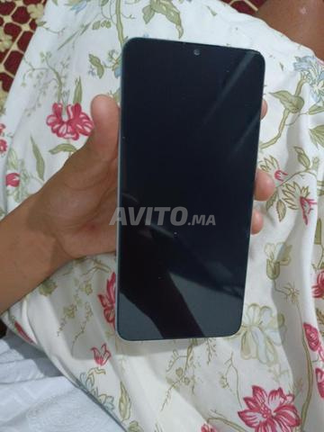 Téléphone Redmi 13c toujours en excellent état 128/8 - 2