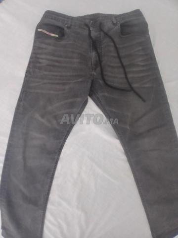 Vends jean Diesel gris stretch