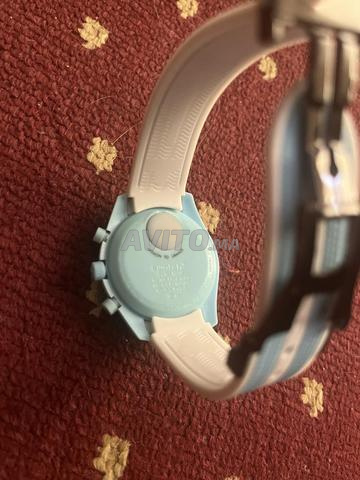 Omega Swatch montre - 2