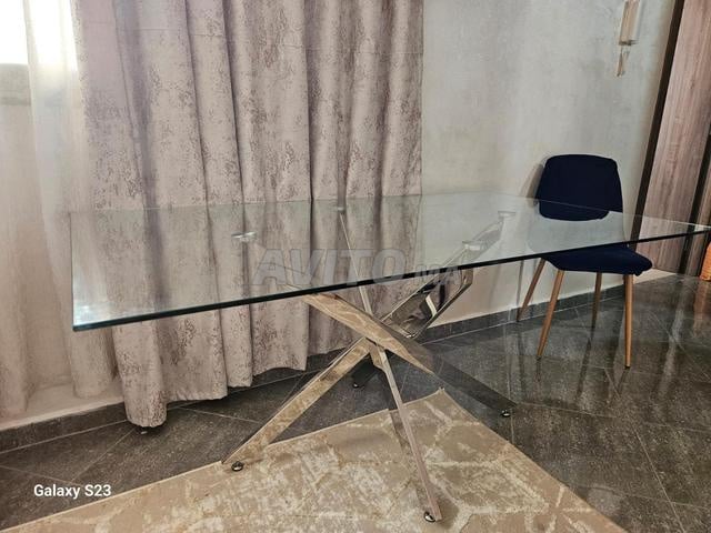 Table à manger moderne en verre et inox