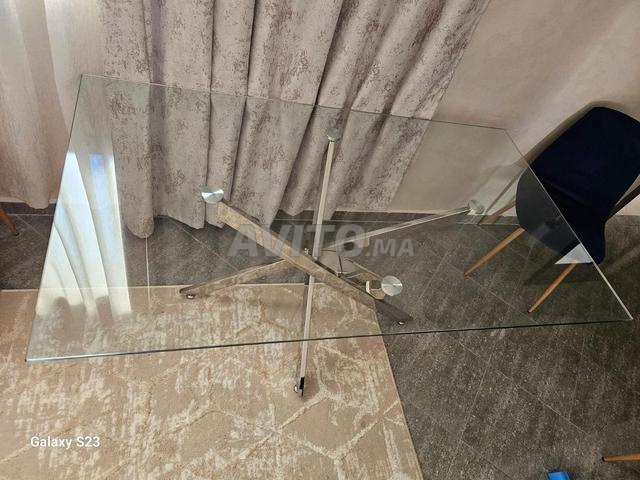 Table à manger moderne en verre et inox