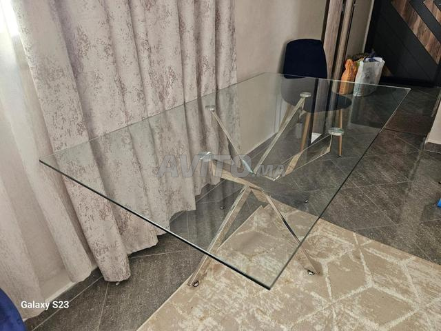 Table à manger moderne en verre et inox