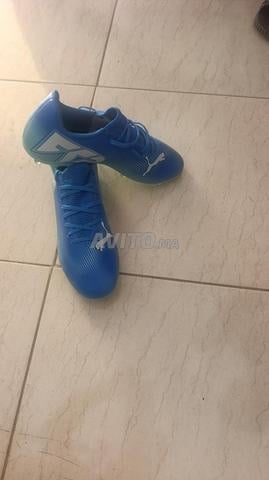 Chaussures de sport pour le football