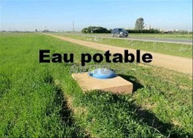 أرض لمركز ترفيهي ومحطة خدمة - 2