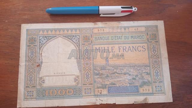 ورقة نقدية 1000 فرنك بنك دولة المغرب 1921
