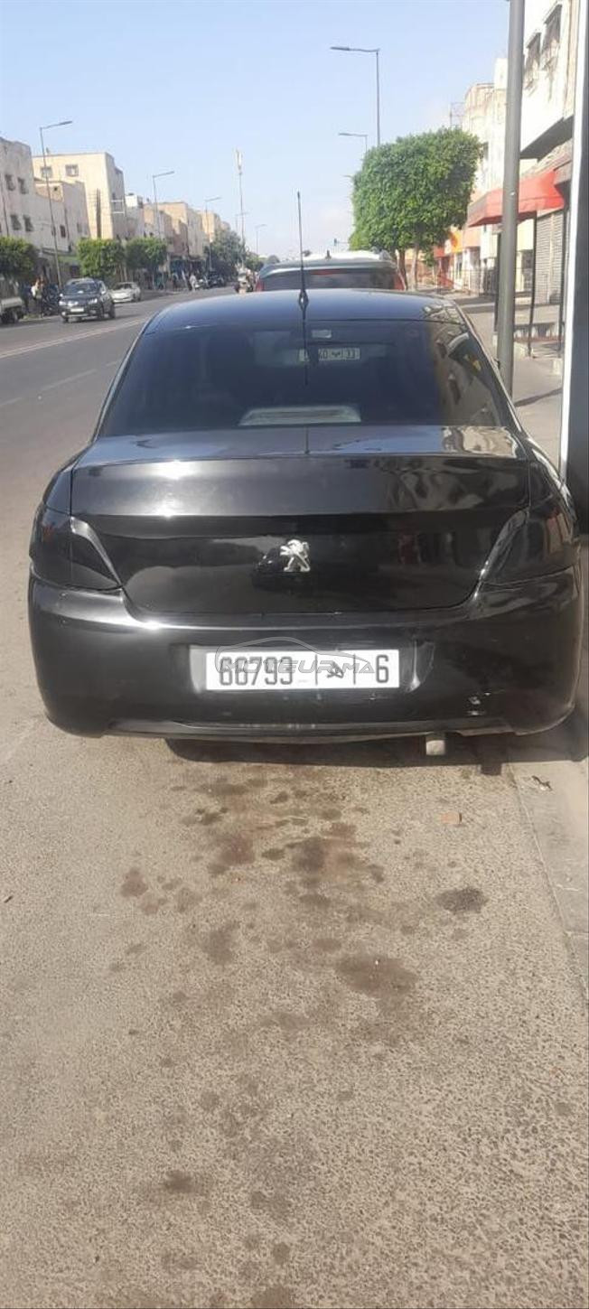 سيارة بوجو 301 اسود لامع 