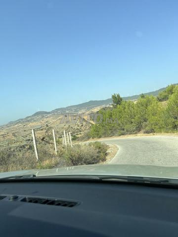 Terrain 2700m Mellousa Ksar Sghir titre - 2