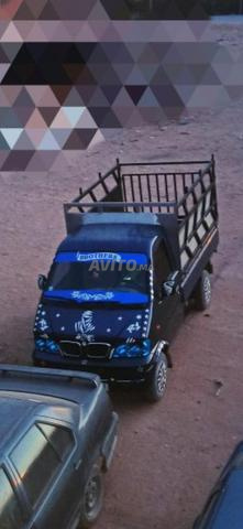 Transport de marchandises avec aide au transport dans toutes les directions