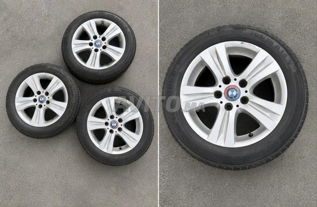 4 جنوط BMW أصلية 16 بوصة مع إطارات