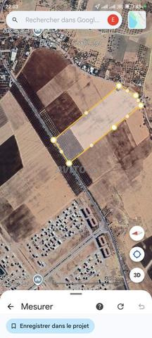 Terrain de 9 hectares titré zone immeuble R+2 à 2 km du quartier Narjis.