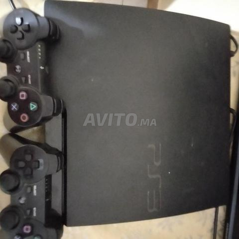 PS3 slim 2 manettes en bon état - 2
