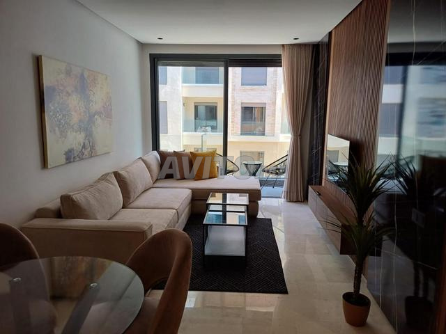 studio neuf avec balcon palmier