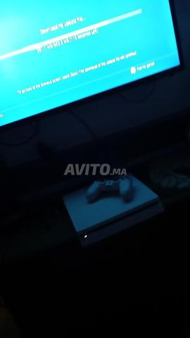 PS4 SLIM BLANCHE et 7 jeux cd - 2