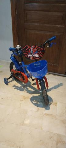 Vélo enfant et rehausseur de voiture - 2