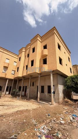 Immeuble semi finit 4 appartements et 2 magasin - 2