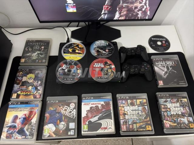 Playstation 3 ultra slim et 2 manettes 15 jeux CD - 2