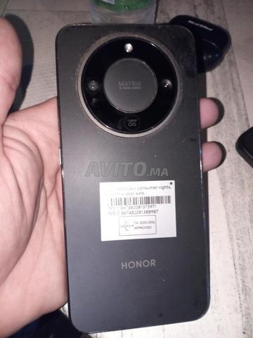 Téléphone comme neuf, chargeur d'origine - 2