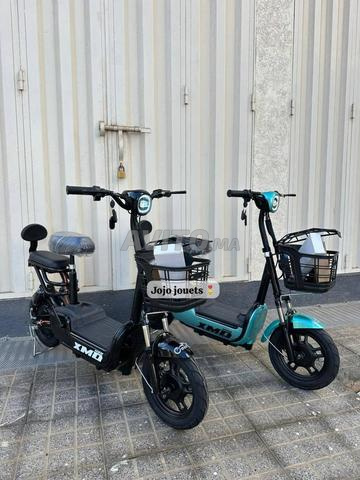 سكوتر كهربائي Xmd 400 ليثيوم 48V15Ah Emove