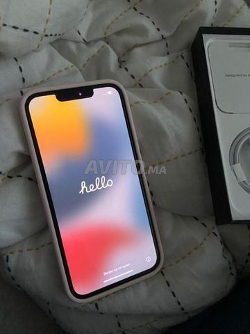 iPhone 13 normal avec câble original 76% batterie - 2
