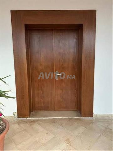 Fabrication de portes en bois de première qualité à prix abordables