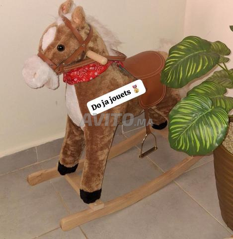 Cheval à bascule avec musique