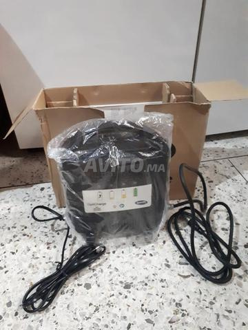 Chargeur pour fauteuil roulant électrique