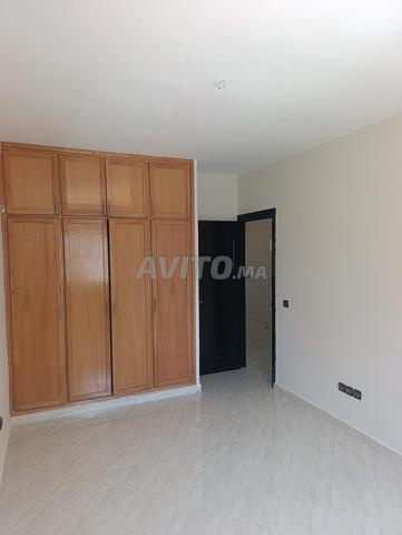 Appartement et garage commercial à vendre