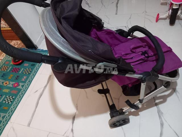 عربة أطفال بحالة جيدة