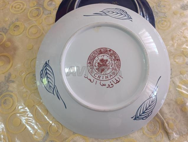 Plat paon rouge taille 40. Original - 2