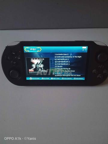 Console de jeux avec lecteur de film intégré - 2