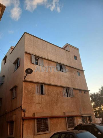 Appartement 20 millions de caution, location 1000 dirhams. - 2