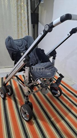عربة أطفال بحالة جيدة جداً. - 2