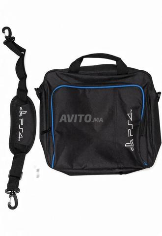 PS4 500 Go - 2 MANETTES - 3 JEUX - SAC PS4 - 2