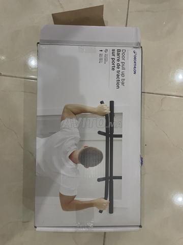 Barre fixe pour porte