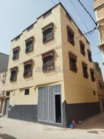 Immeuble rez-de-chaussée avec 2 étages à vendre
