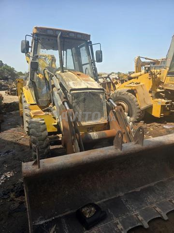 Caterpillar 428-C bon état - 2