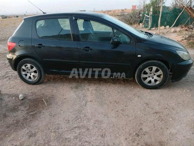 Peugeot 307 modèle 2003, finition essence, taxe 650 dirhams, carte grise