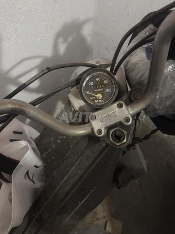 Moto de type Swing - 2