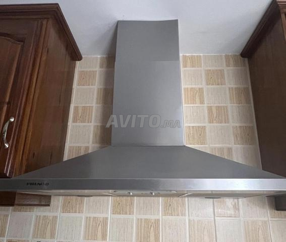 Cuisinière à gaz 5 feux 70x50 et hotte aspirante