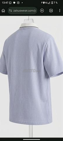 Polo homme avec rayure col V fermeture zip - 2