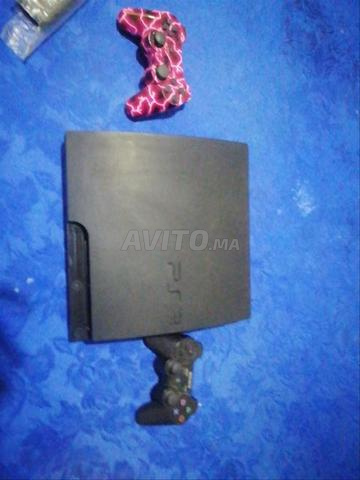 بلايستيشن 3 PS3 و يد تحكم حمراء أصلية و يد تحكم أخرى و 6 ألعاب