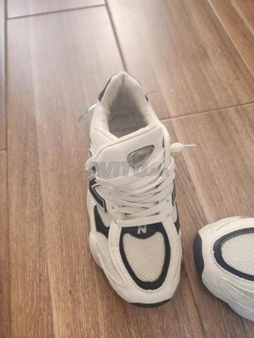 Paire de New Balance blanche et noire - 2