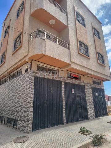 🏢 محل تجاري للكراء مع مرأب – سيدي علال البحراوي
